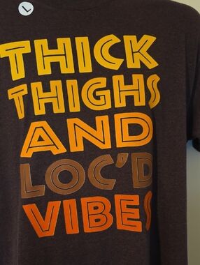 Graphic Tee "Thick Thighs and Loc'd Vibes" - Brown with Yellow & Orange Print